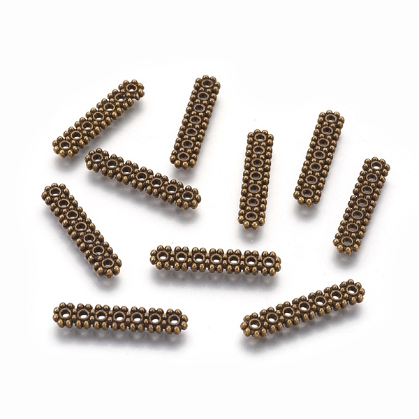 

PandaHall Tibetan Style Beads Spacers, Rectangle, Cadmium Free & Nickel Free & Lead Free, 7-Hole, Antique Bronze, 23x5x2mm, Hole: 1mm Alloy...