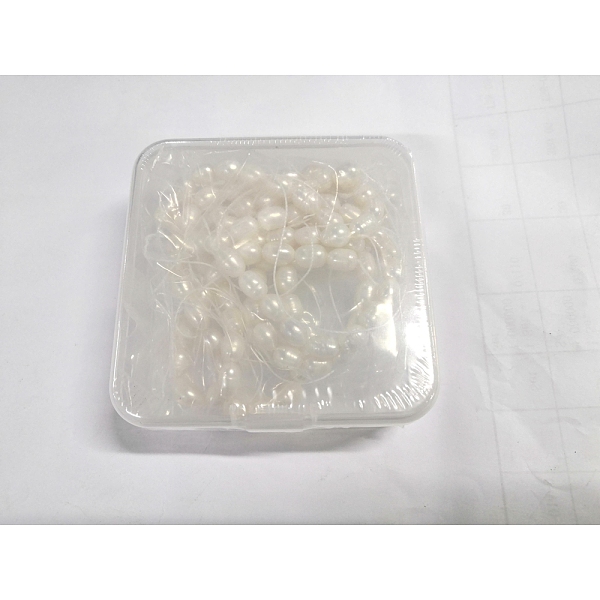 

PandaHall Natural Cultured Freshwater Pearl Beads Strands, Rice, White, 7~9x6~7mm, Hole: 0.7mm, about 20~23pcs/Strand, 7.48 inch(19cm)...