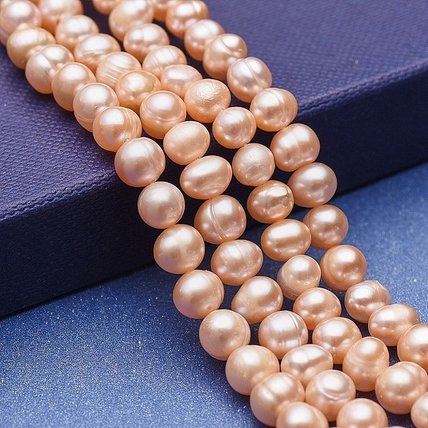 

PandaHall Natural Cultured Freshwater Pearl Beads Strands, Potato, Bisque, 6~7x6~6.5mm, Hole: 0.5mm, about 58~59pcs/strand, 13.77~13.97 inch..., Orange