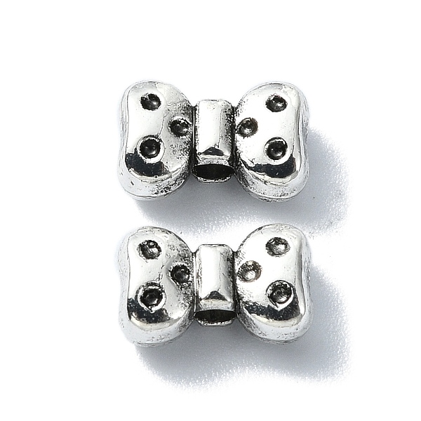 

PandaHall Tibetan Style Alloy Beads, Bowknot, Antique Silver, 5.5x9x3.5mm, Hole: 1.8mm, about 694pcs/500g Alloy Bowknot