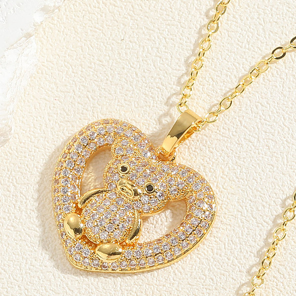 

PandaHall Real 14K Gold Plated Brass Cubic Zircon Pendant Necklace for Women, Heart with Bear, Clear, 17.72 inch(45cm) Cubic Zirconia Heart...