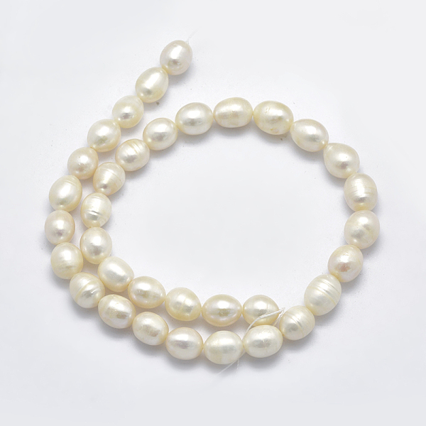 

PandaHall Natural Cultured Freshwater Pearl Beads Strands, Oval, Beige, 10~14x9~10mm, Hole: 0.8mm, about 34pcs/strand, 13.8 inch(35cm) Pearl..., Yellow