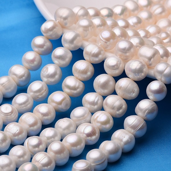 

PandaHall Natural Cultured Freshwater Pearl Beads Strands, Round, Beige, 12~13mm, Hole: 0.8mm, about 33pcs/strand, 14.96 inch Pearl Round..., Yellow