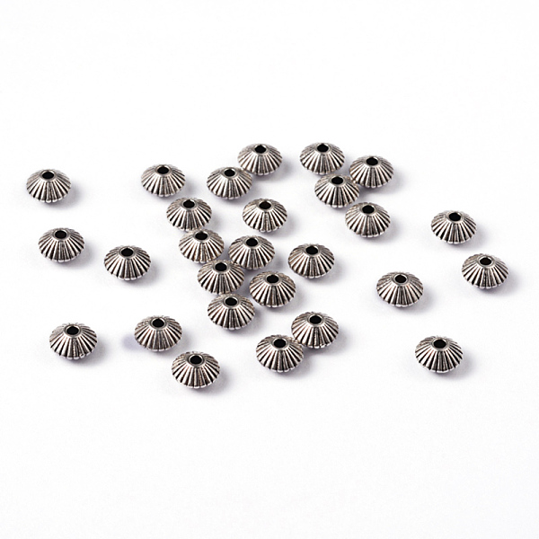 

PandaHall Tibetan Style Alloy Spacer Beads, Lead Free & Cadmium Free, Bicone, Antique Silver, 7.5x4.6mm, Hole: 1mm Alloy Oval
