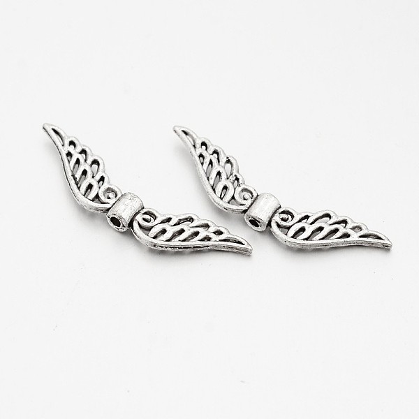 

PandaHall Tibetan Style Alloy Beads, Cadmium Free & Lead Free, Wings, Antique Silver, 7x31x3mm, Hole: 1mm, about 1100pcs/kg Alloy Wing