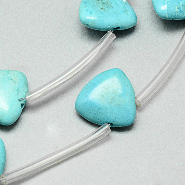 

PandaHall Synthetic Turquoise Beads Strands, Dyed, Triangle, 14x14x5mm, Hole: 1mm, about 12pcs/strand, 15.7 inch Synthetic Turquoise...