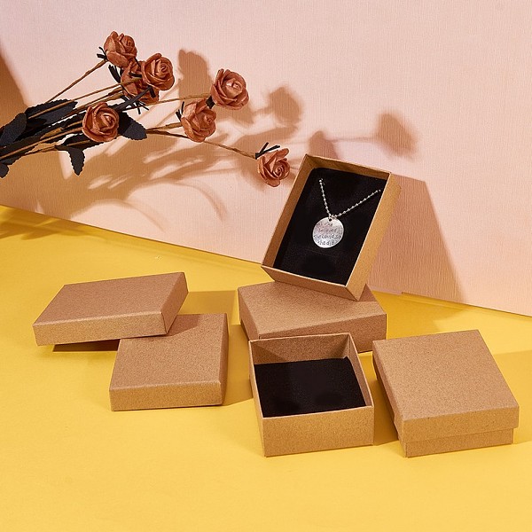 

PandaHall Kraft Cotton Filled Cardboard Paper Jewelry Set Boxes, for Ring, Necklace, with Sponge inside, Rectangle, Tan, 9x7x3cm, Inner Size..., Orange