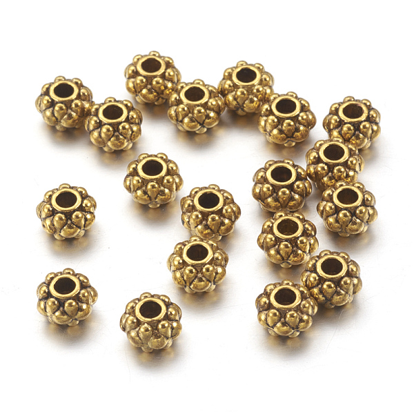 

PandaHall Tibetan Style Beads, Antique Golden Color, Lead Free & Cadmium Free, Flower, Size: 6.5x4.5mm thick, Hole: 1mm Alloy Flower