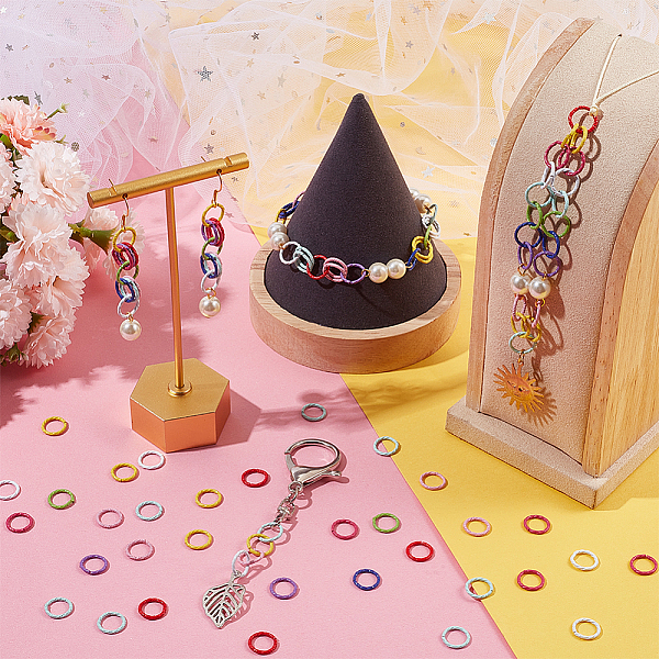 

PandaHall 270Pcs 9 Colors Embossed Style Iron Open Jump Rings, Round Ring, Mixed Color, 18 Gauge, 10x1mm, Inner Diameter: 7.5mm..., Multicolor