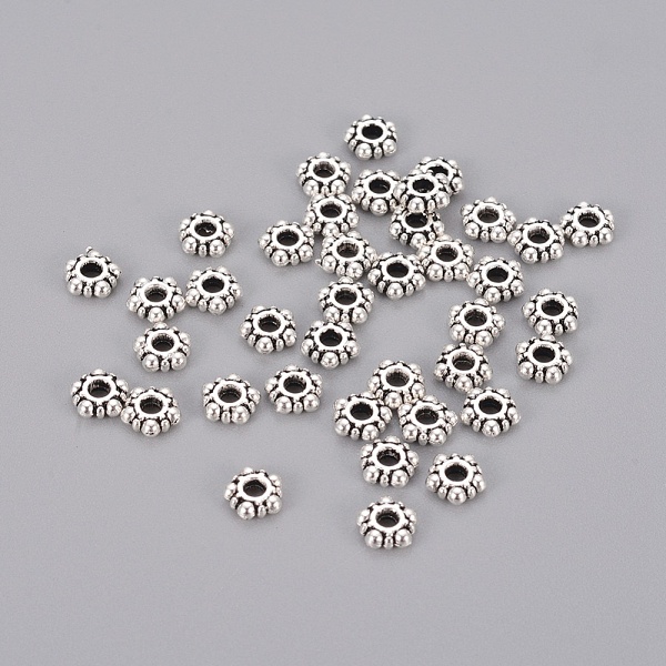 

PandaHall Tibetan Silver Spacers beads, Lead Free & Cadmium Free, Rondelle, Antique Silver, about 5.8mm wide, 2.2mm long, Hole: about 1.5mm...