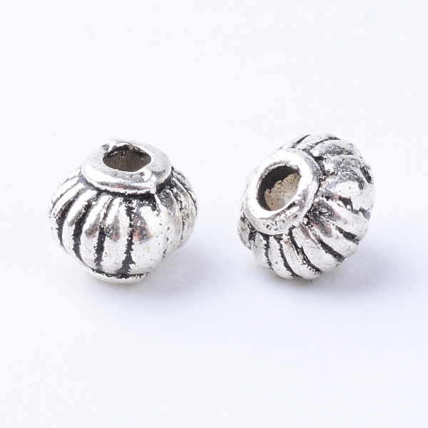 

PandaHall Tibetan Style Alloy Spacer Beads, Rondelle, Cadmium Free & Lead Free, Antique Silver, 5x4mm, Hole: 1mm, about 3400pcs/1000g Alloy...