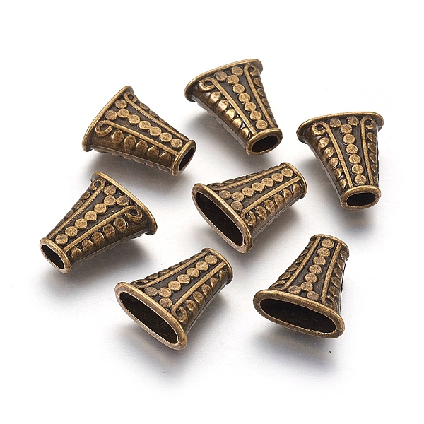 

PandaHall Tibetan Style Alloy Bead Cones, For Tassels Pendant, Antique Bronze, Lead Free & Cadmium Free, 17mm wide, 18mm long, 9mm thick...