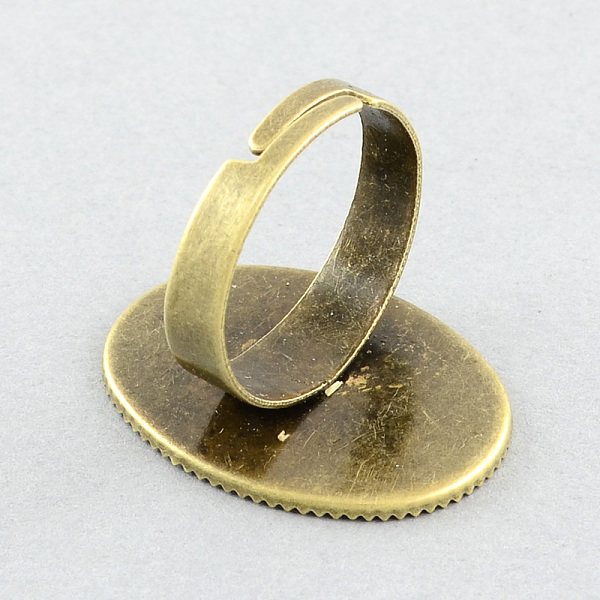 

PandaHall Brass Pad Ring Settings, Adjustable, Oval, Antique Bronze, 18mm, tray: 25x18mm Brass