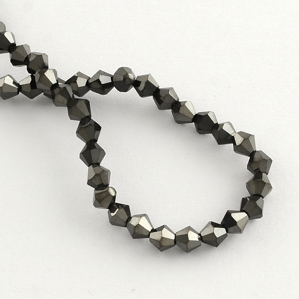 

PandaHall Electroplate Glass Bead Strands, Rainbow Plated, Faceted Bicone, Black Plated, 4x4.5mm, Hole: 1mm, 92~96pcs/strand, 13.78~14.37...