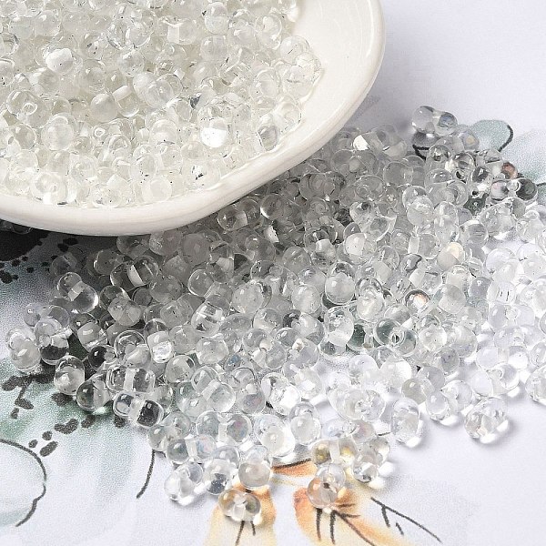 

PandaHall Glass Seed Beads, Peanut, Clear, 5.5~6x3~3.5x3mm, Hole: 1~1.2mm, about 4000pcs/pound Glass Peanut Clear