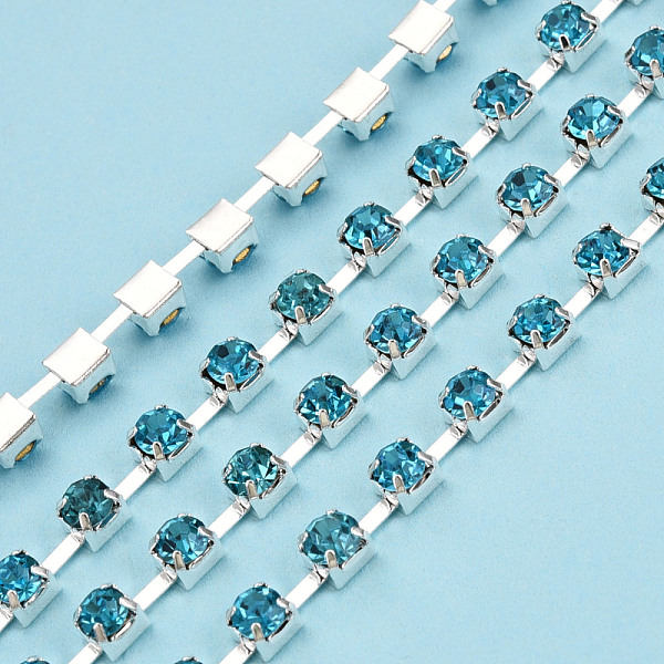 

PandaHall Silver Plated Brass Rhinestone Strass Chains, Rhinestone Cup Chains, Soldered, with Spool, Aquamarine, 3mm, about 32.81 Feet..., Cyan