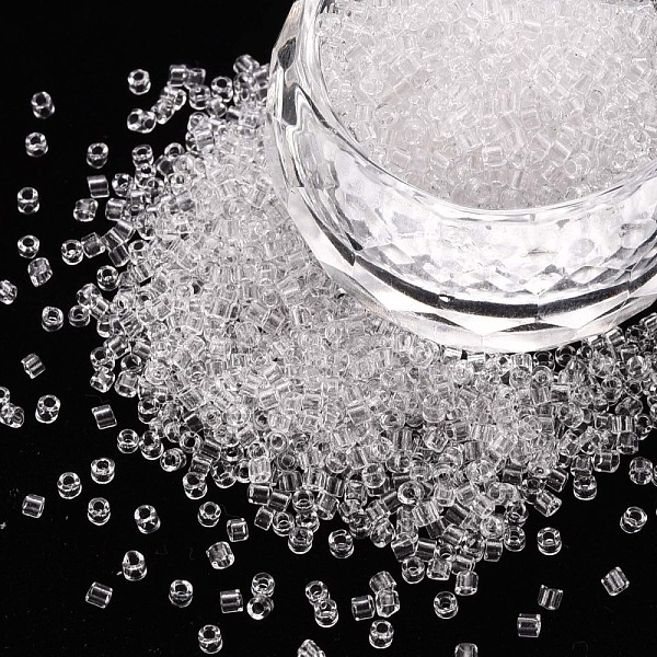 

PandaHall Transparent Glass Cylinder Beads, Seed Beads, Round Hole, Clear, 1.5~2x1~2mm, Hole: 0.8mm, about 8000pcs/bag, about 1pound/bag...