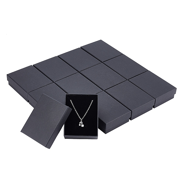 

PandaHall 12Pcs Kraft Cotton Filled Cardboard Paper Jewelry Set Boxes, for Ring, Necklace, with Sponge inside, Rectangle, Black, 9x7x3cm...