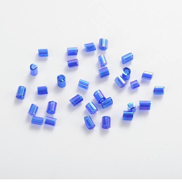 

PandaHall 11/0 Two Cut Glass Seed Beads, Hexagon, Transparent Colours Rainbow, Blue, about 2mm long, 2mm wide, hole: 0.5mm, about...