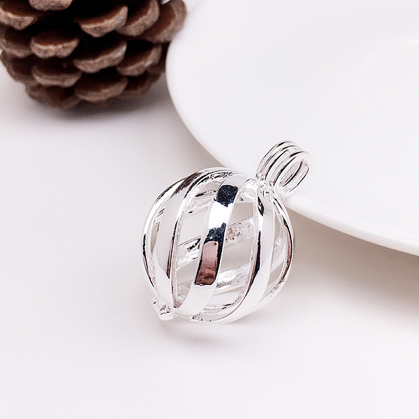 

PandaHall Brass Bead Cage Pendants, Hollow Round Charms, for Chime Ball Pendant Necklaces Making, Silver, 32.5x22mm Brass Round