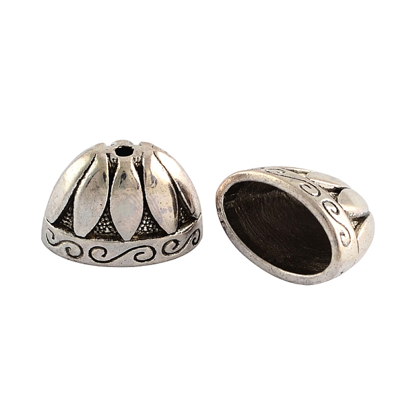

PandaHall Tibetan Style Alloy Bead Cones, For Tassels Pendant, Cadmium Free & Lead Free, Antique Silver, 13x20x12mm, Hole: 2mm Alloy
