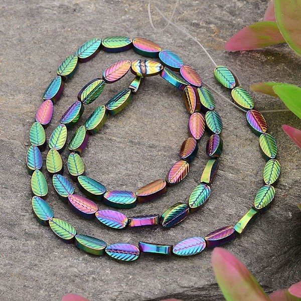 

PandaHall Electroplated Leaf Non-magnetic Synthetic Hematite Bead Strands, Multi-color Plated, 7.5x4x2mm, Hole: 0.5mm, about 55pcs/strand...