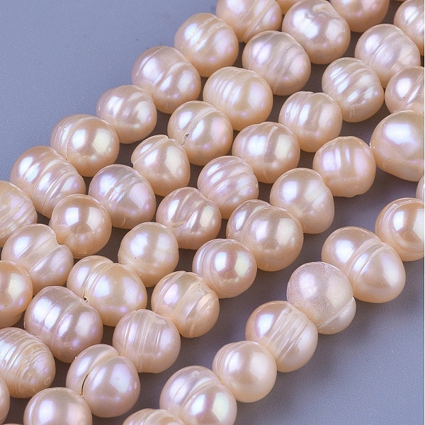 

PandaHall Natural Cultured Freshwater Pearl Beads Strands, Round, PeachPuff, 7~8mm, Hole: 0.8mm, about 57pcs/strand, 14.37 inch Pearl Round..., Brown