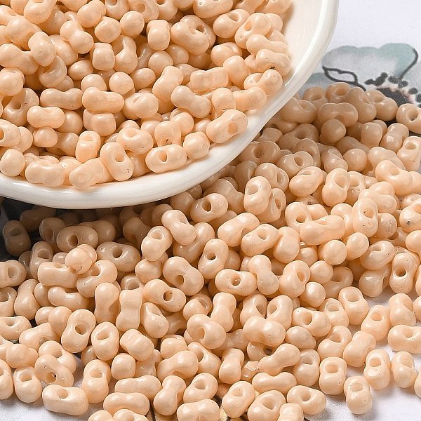 

PandaHall Baking Paint Glass Seed Beads, Peanut, Bisque, 5.5~6x3~3.5x3mm, Hole: 1~1.2mm, about 4000pcs/pound Glass Peanut Orange