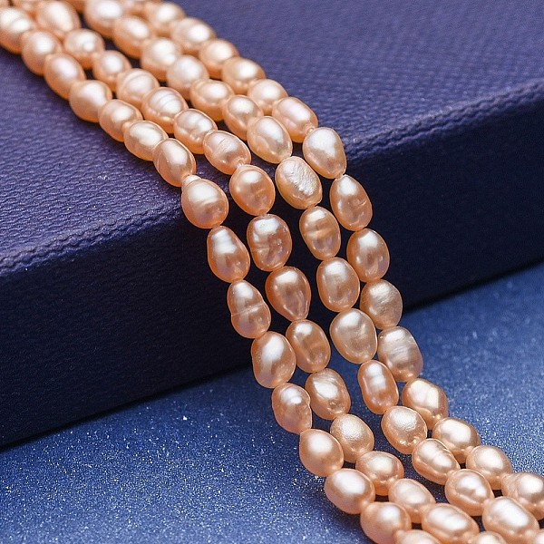 

PandaHall Natural Cultured Freshwater Pearl Beads Strands, Potato, Bisque, 4~5x3~3.5mm, Hole: 0.5mm, about 76~77pcs/strand, 13.58 inch..., Orange