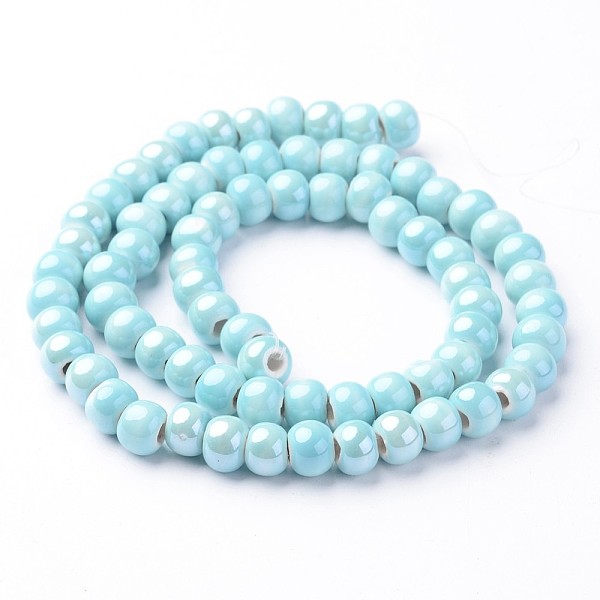 

PandaHall Handmade Porcelain Beads, Bright Glazed Porcelain, Rondelle, Light Sky Blue, 7x5mm, Hole: 2mm, about 65pcs/strand, 13.3 inch...