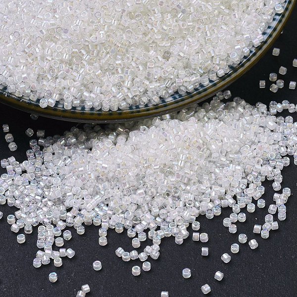 

PandaHall MIYUKI Delica Beads, Cylinder, Japanese Seed Beads, 11/0, (DB0052) Pale Peach Lined Crystal AB, 1.3x1.6mm, Hole: 0.8mm, about..., Clear