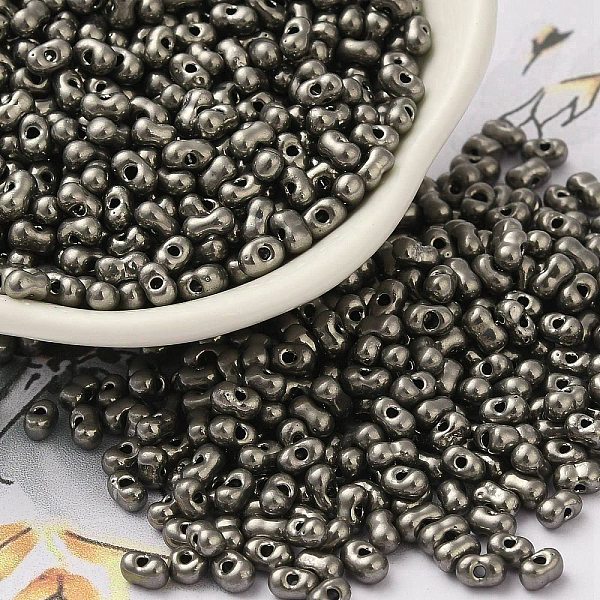 

PandaHall Opaque Glass Seed Beads, Peanut, Gray, 3.5~4x2~2.5x2~2.3mm, Hole: 0.8mm, about 8000pcs/pound Glass Peanut Gray