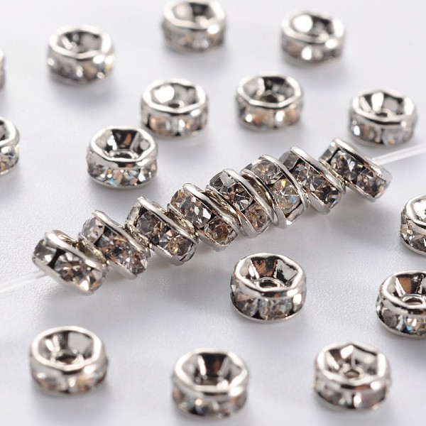 

PandaHall Brass Rhinestone Spacer Beads, Grade AAA, Straight Flange, Nickel Free, Platinum Metal Color, Rondelle, Crystal, 4x2mm, Hole: 1mm..., Clear