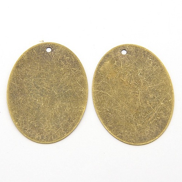 

PandaHall Metal Tags, Brass Stamping Blank Tag Pendants, Oval, Antique Bronze, 40x30x0.5mm, Hole: 1.5mm Brass Oval