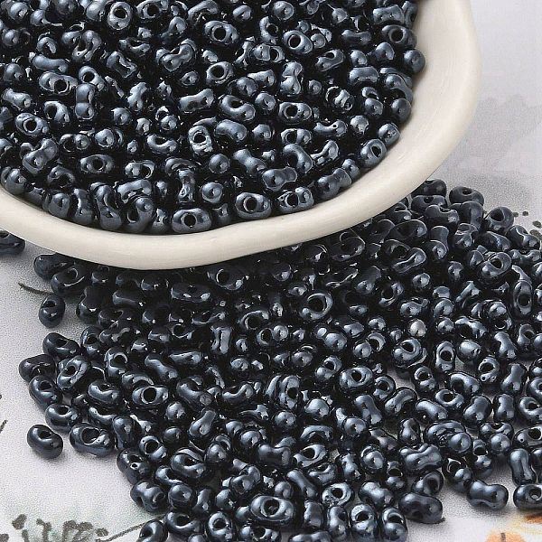 

PandaHall Opaque Glass Seed Beads, Peanut, Marine Blue, 3.5~4x2~2.5x2~2.3mm, Hole: 0.8mm, about 8000pcs/pound Glass Peanut