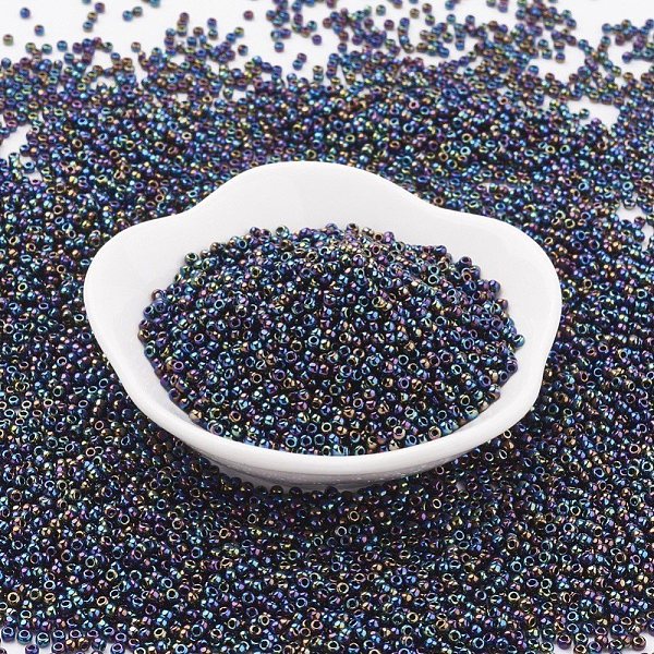 

PandaHall TOHO Japanese Seed Beads, Round, 11/0, (86) Metallic AB Iris, 2x1.5mm, Hole: 0.5mm, about 42000pcs/pound Glass Purple