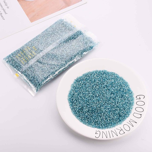 

PandaHall Glass Bugle Beads, Silver Lined, Sky Blue, 1.8~2.2x1.8~2mm, Hole: 0.8~0.9mm, about 15000pcs/pound Glass