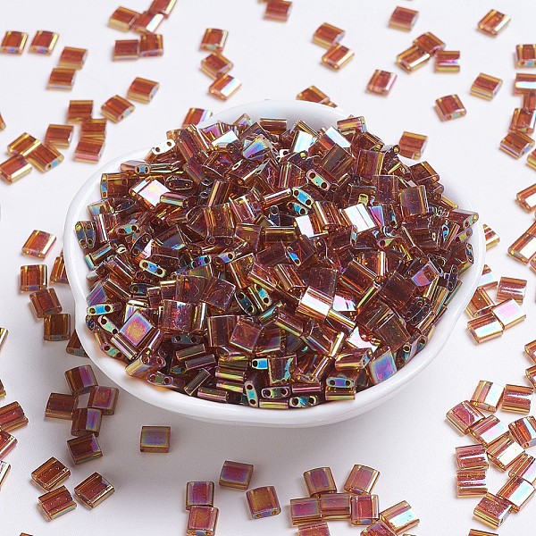 

PandaHall MIYUKI TILA Beads, Japanese Seed Beads, 2-Hole, (TL257) Transparent Topaz AB, 5x5x1.9mm, Hole: 0.8mm, about 590pcs/50g Glass Brown