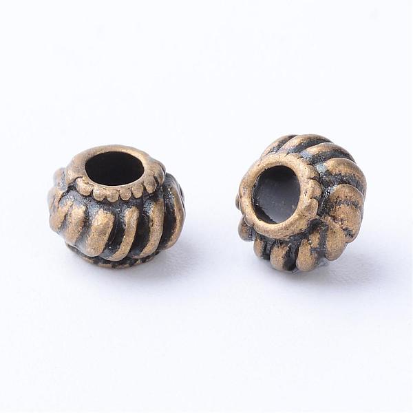 

PandaHall Tibetan Style Alloy Beads, Cadmium Free & Nickel Free & Lead Free, Antique Bronze, 6.5x4.5mm, Hole: 2.5mm, about 2170pcs/1000g...