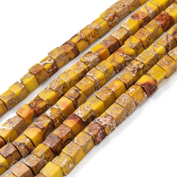 

PandaHall Natural Imperial Jasper Beads Strands, Dyed, Cube, Dark Goldenrod, 7x7x7mm, Hole: 1.2mm, about 59~60pcs/strand, 15.1~15.3 inch...