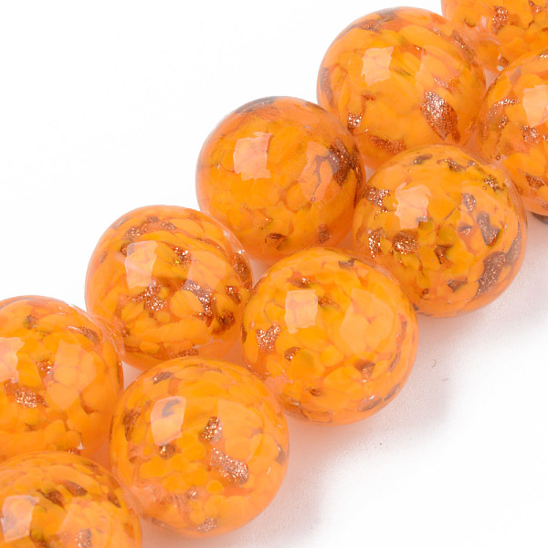 

PandaHall Handmade Gold Sand Lampwork Beads, Inner Flower, Round, Orange, 20x19~20mm, Hole: 2mm, about 20pcs/strand, 14.96 inch(38cm)...
