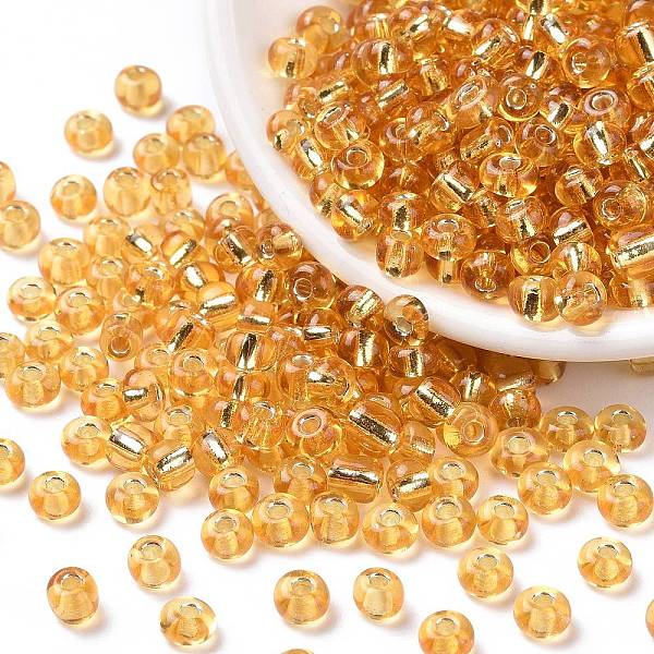 

PandaHall 6/0 Transparent Glass Round Seed Beads, Grade A, Silver Lined, Champagne Yellow, 3.6~4.0mm, Hole: 1.2mm, about 500pcs/50g Glass...