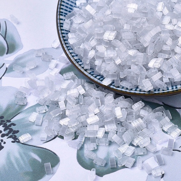 

PandaHall MIYUKI Half TILA Beads, Japanese Seed Beads, 2 Hole, (HTL2595) Silk Pale Shadow, 5x2.3x1.9mm, Hole: 0.8mm, about 250pcs/10g Glass..., Clear