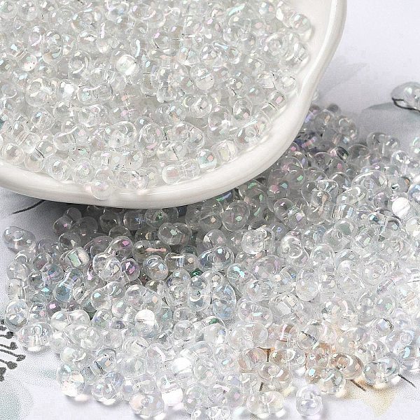 

PandaHall Glass Seed Beads, Peanut, Clear, 5.5~6x3~3.5x3mm, Hole: 1~1.2mm, about 4000pcs/pound Glass Peanut Clear