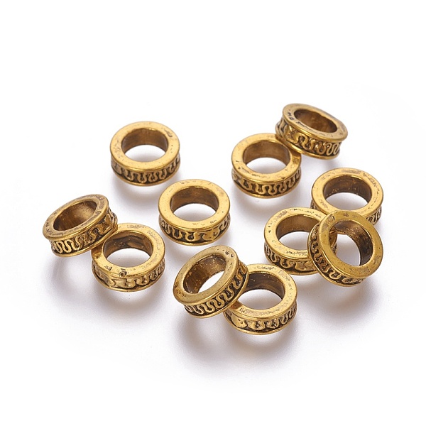 

PandaHall Tibetan Style Alloy Beads, Lead Free & Cadmium Free & Nickel Free, Rondelle, Antique Golden Color, Size: about 11mm in diameter...