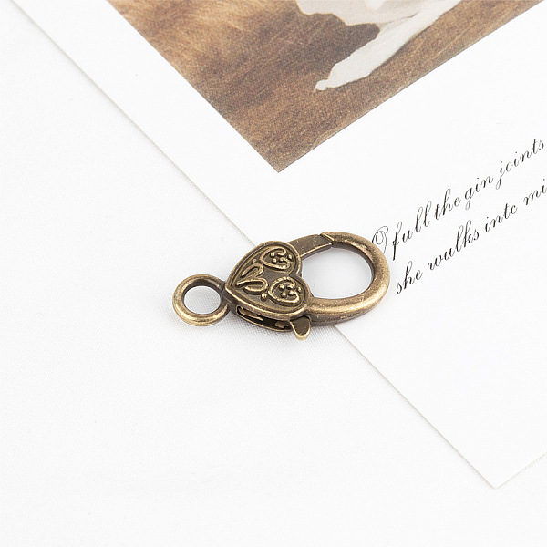 

PandaHall Zinc Alloy Lobster Claw Clasps, Antique Bronze, 26.5~27mm Alloy Others