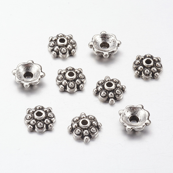 

PandaHall Tibetan Style Alloy Bead Caps, Lead Free, Cadmium Free and Nickel Free, Antique Silver, Flower, about 8mm in diameter, 3mm thick...
