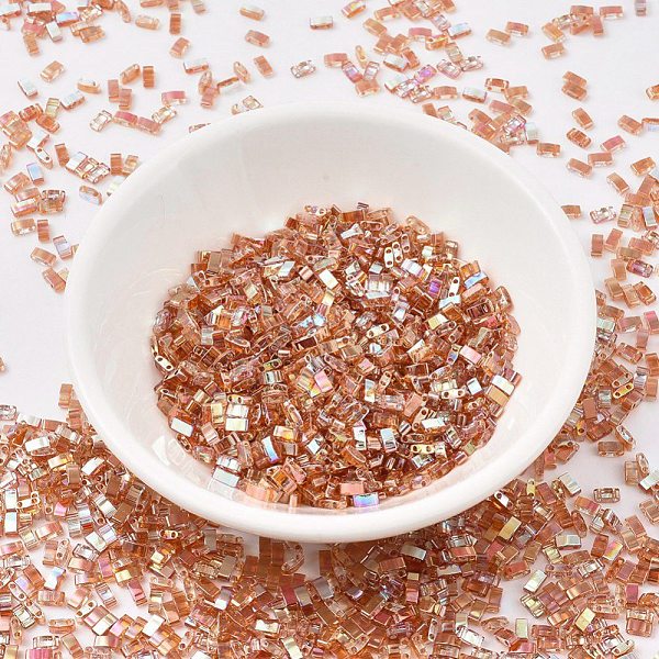 

PandaHall MIYUKI Half TILA Beads, Japanese Seed Beads, 2 Hole, (HTL4576) Crystal Orange Rainbow, 5x2.3x1.9mm, Hole: 0.8mm, about 1250pcs/50g...