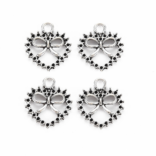 

PandaHall Tibetan Style Alloy Pendants, Cadmium Free & Lead Free, Heart with Bowknot, Antique Silver, 19x17x2.5mm, Hole: 2.5mm, about...