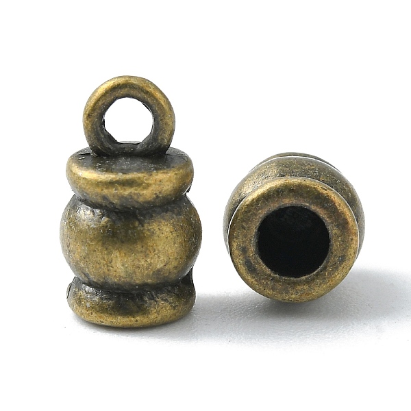 

PandaHall Tibetan Style Terminators, Barrel, Lead Free & Nickel Free & Cadmium Free, Antique Bronze, 11x6.5mm, Hole: 2mm, Inner Diameter...